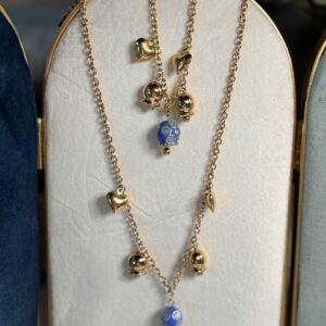 Parure con campanella smaltata azzurra ( collana e bracciale)